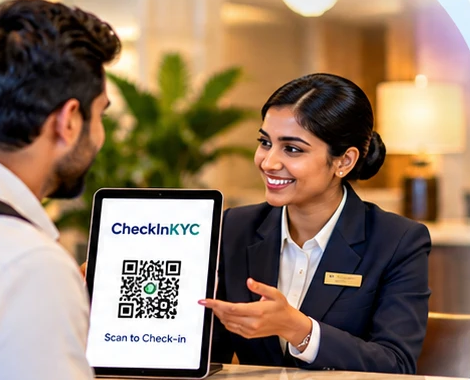 A receptionist shows a guest the check-in QR code on a tablet